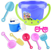 Children Playing In The Sand With Beach Toys