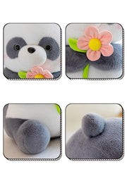 "Blumen haltende Panda-Plüschpuppe"