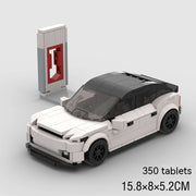 Chinesische Puzzle-Bausteine Tesla-Technologie Auto Kinder Lernspielzeug