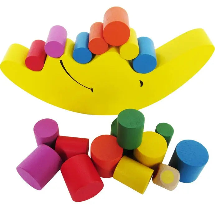 Gelbes Mond Holz Balance Spiel mit bunten Holzsteinen zum Stapeln