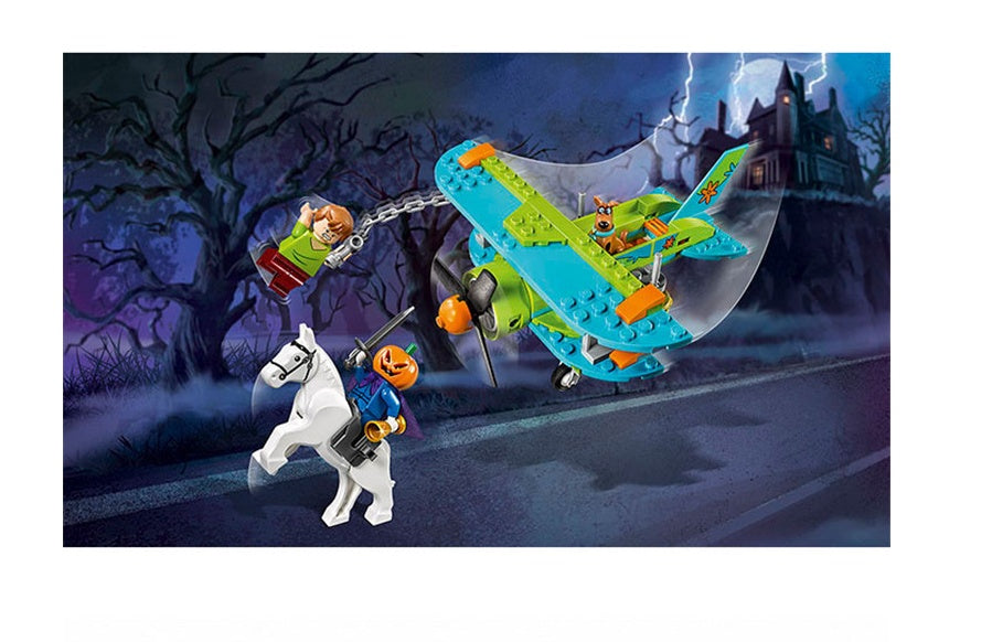 Verpackung des Scooby-Doo Mystery Machine Klemmbaustein-Sets mit Flugzeug und Figuren